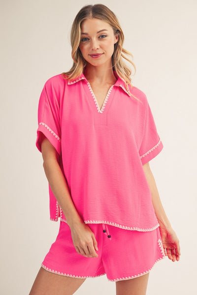 model wearing hot Pink top & shorts