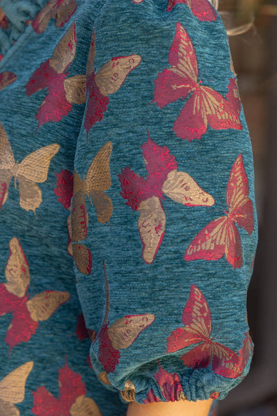 37314 Ruffled V-Neck Butterfly Jacquard Top