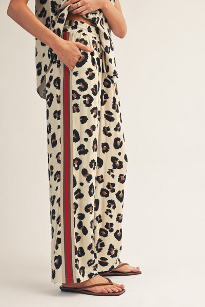 model wearing leopard drawstring pants