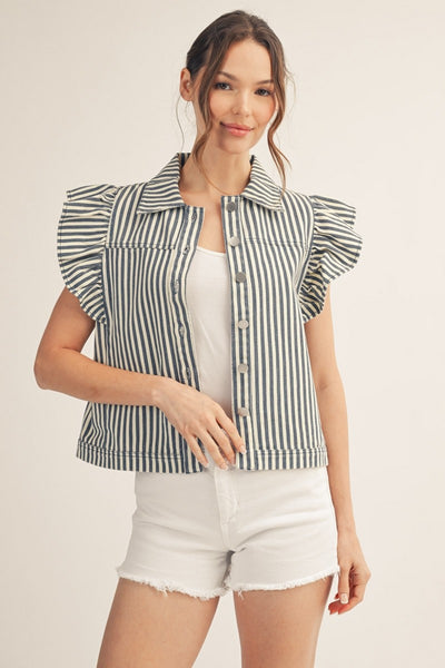 model wearing a blue striped button down top with ruffle sleeves