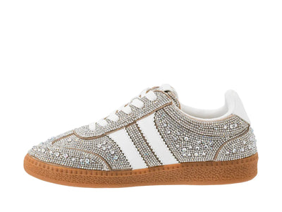 Sneaker with rhinestone embellishments on a white background