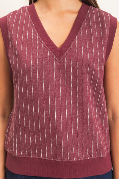 close up of burgundy striped v neck top