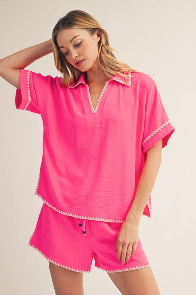 model wearing hot Pink top & shorts