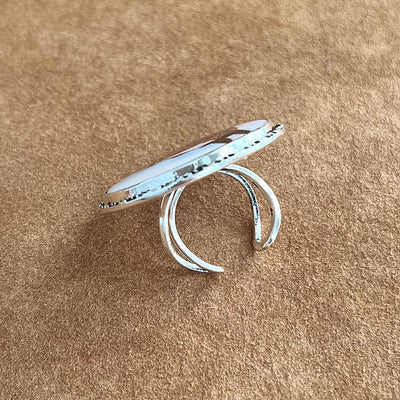 cuff ring with tan background