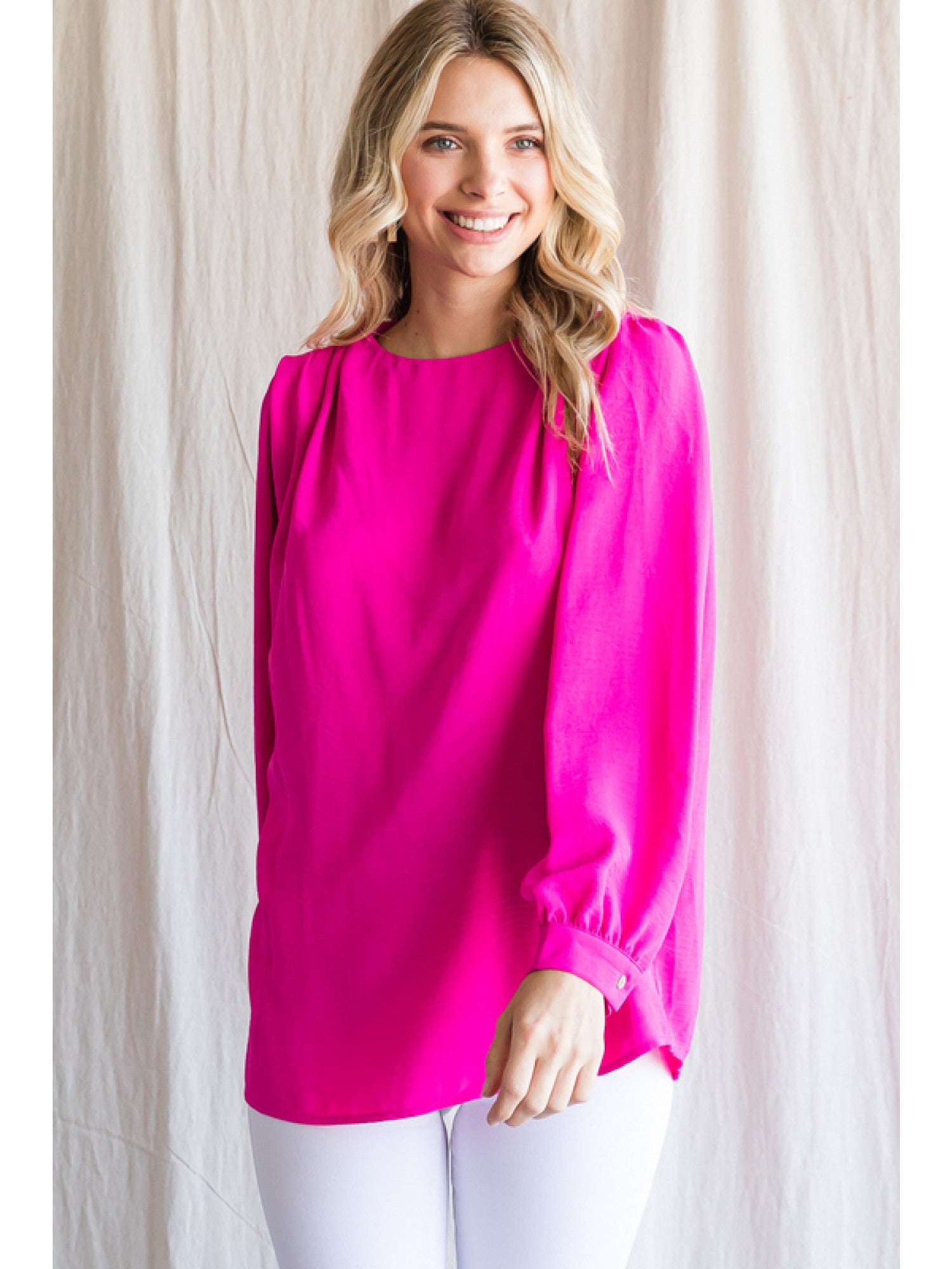 Torrey Solid top with a U-neck, Tucking Shoulders.