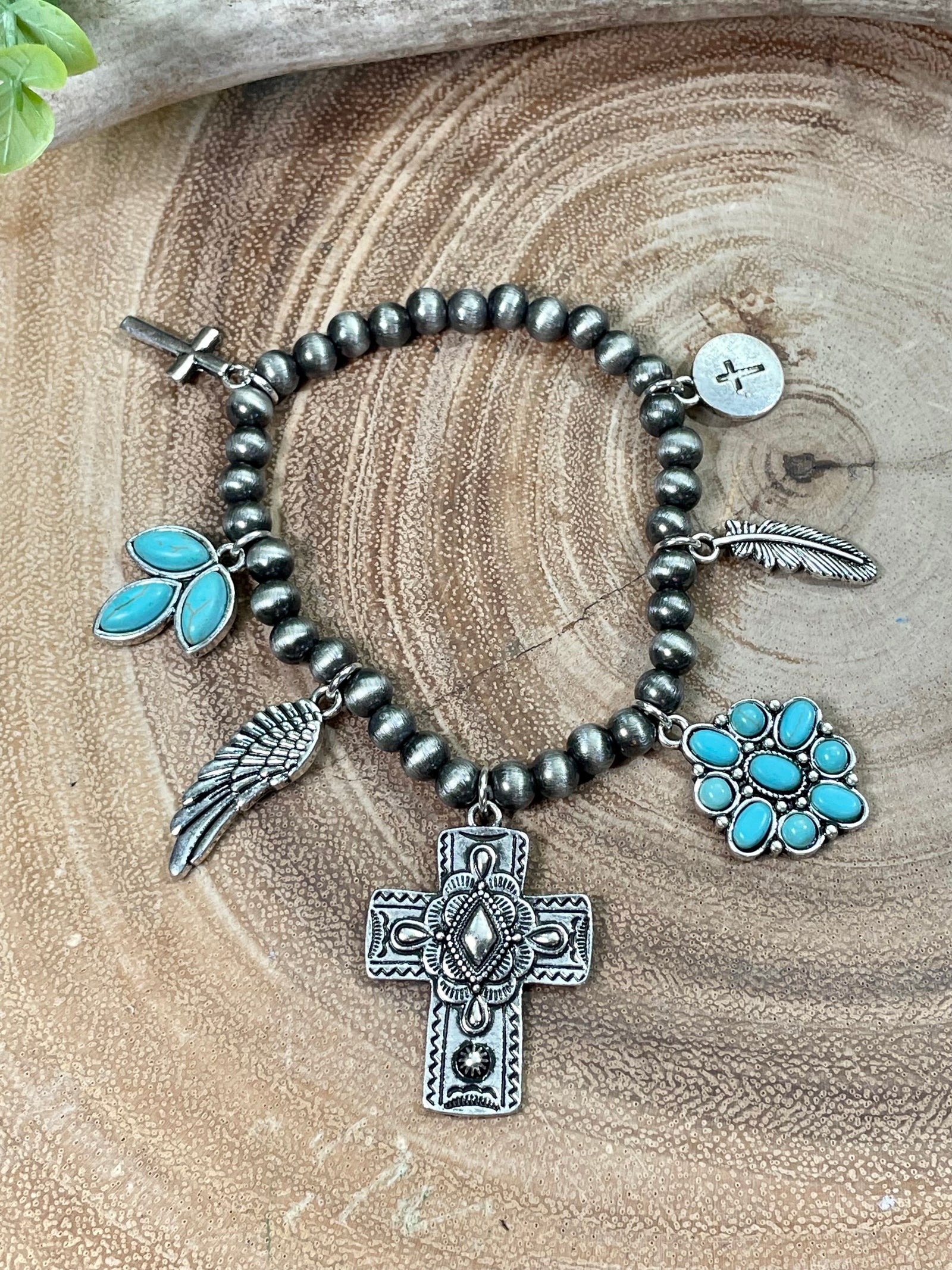 Covington Fashion Stretch Bracelet with Cross Charm Cluster