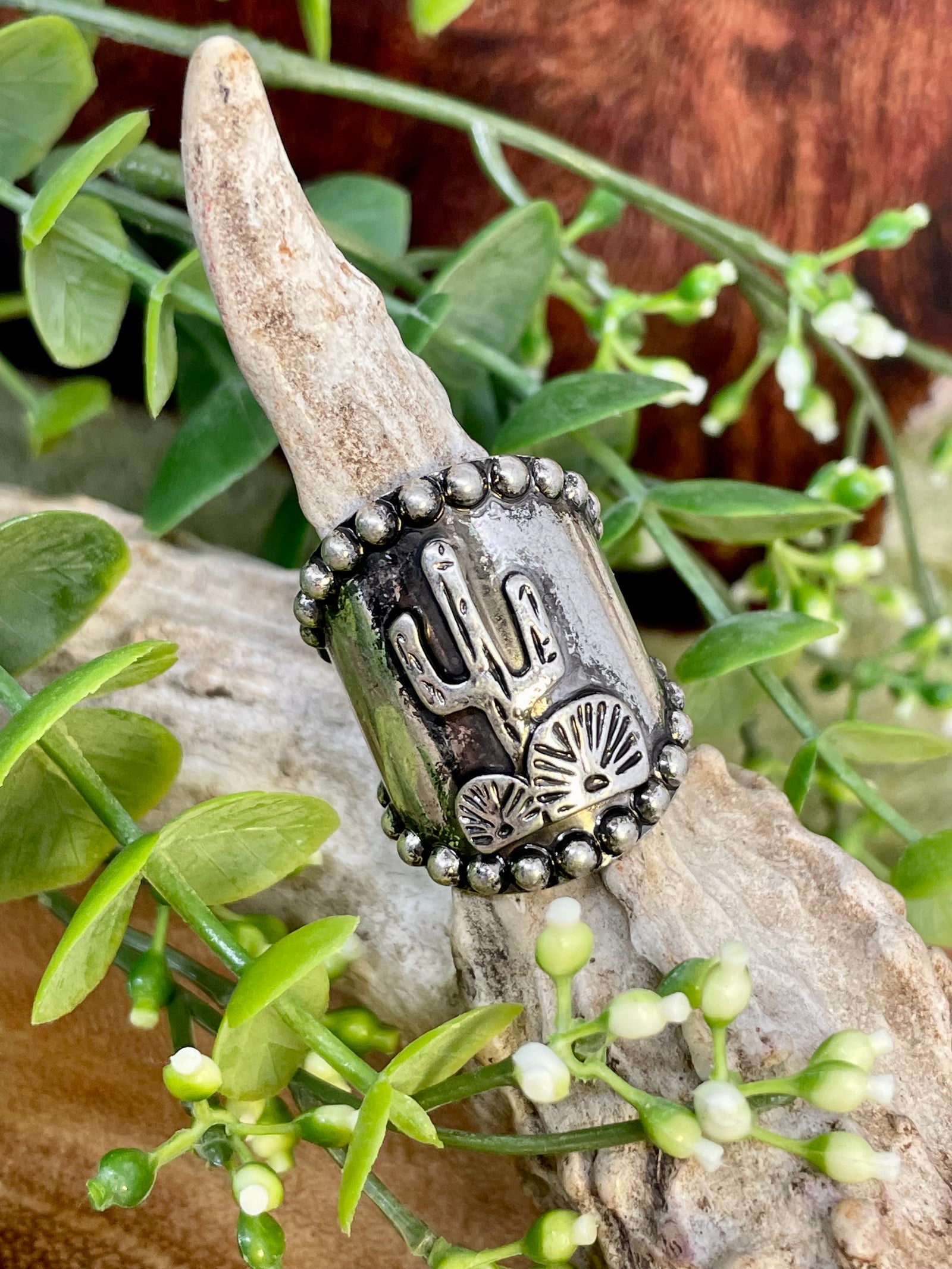 silver cactus cuff ring on display